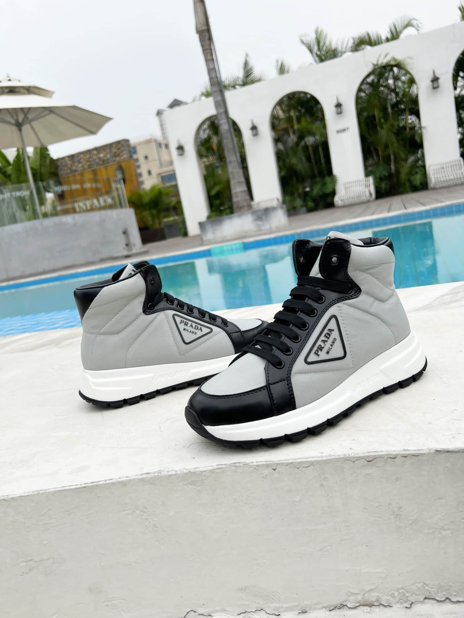 Prada Prax 01 Re Nylon And Brushed Leather Sneakers Grey