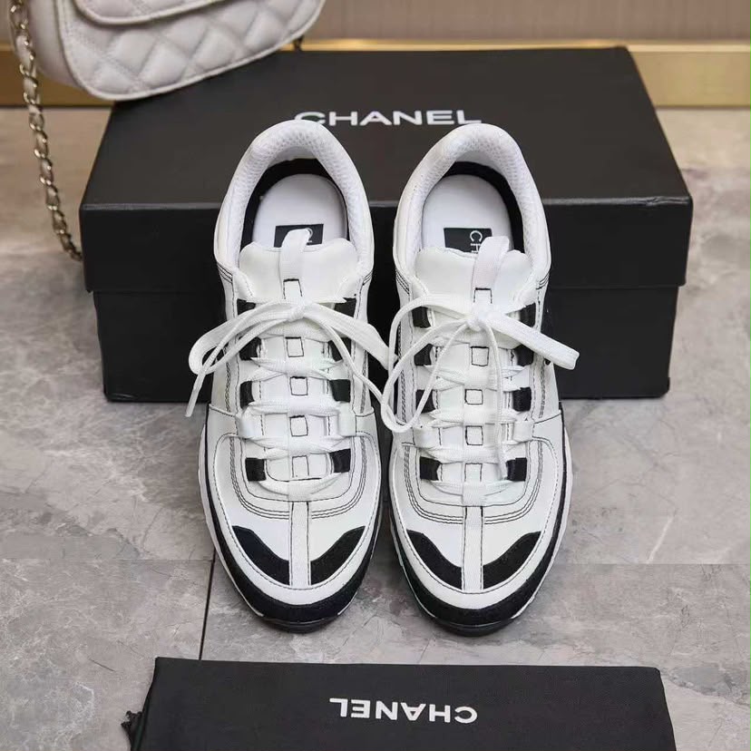 Chanel Lace Up Sneakers White Black