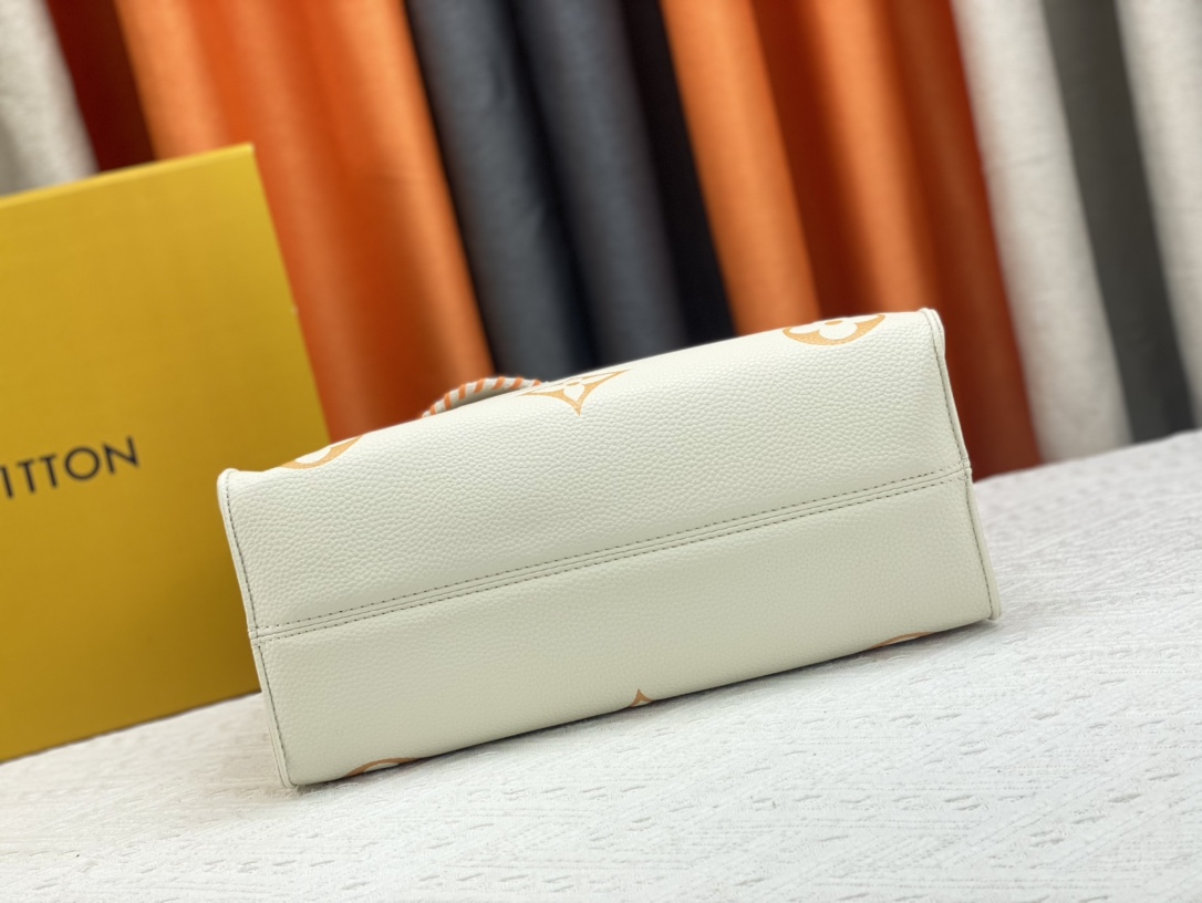 Louis Vuitton On The Go Mm Monogram Empreinte Leather White 34Cm M45717