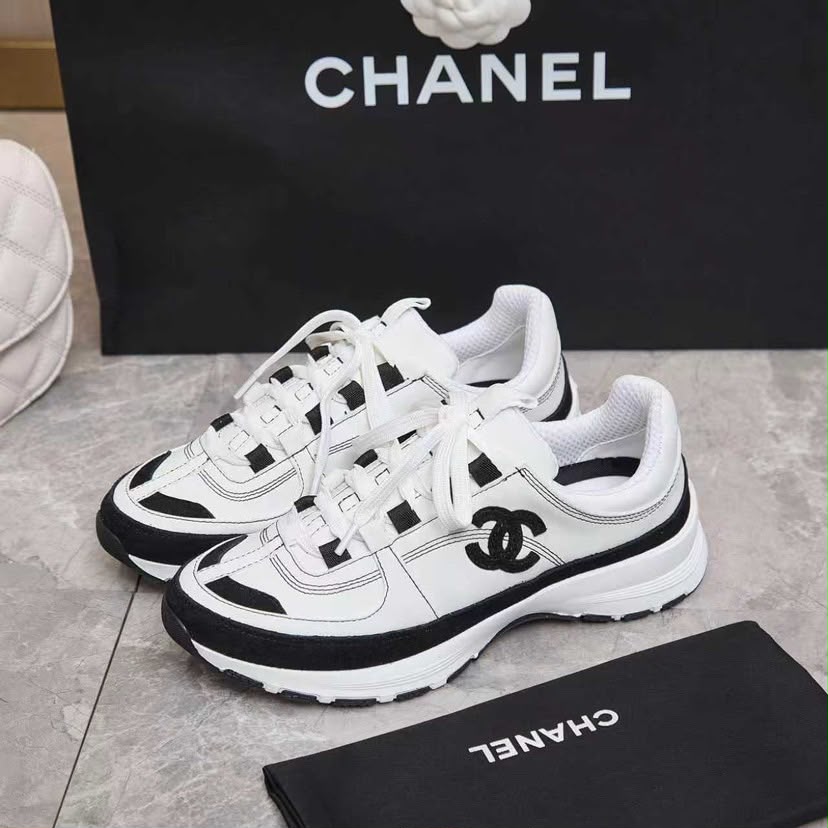 Chanel Lace Up Sneakers White Black