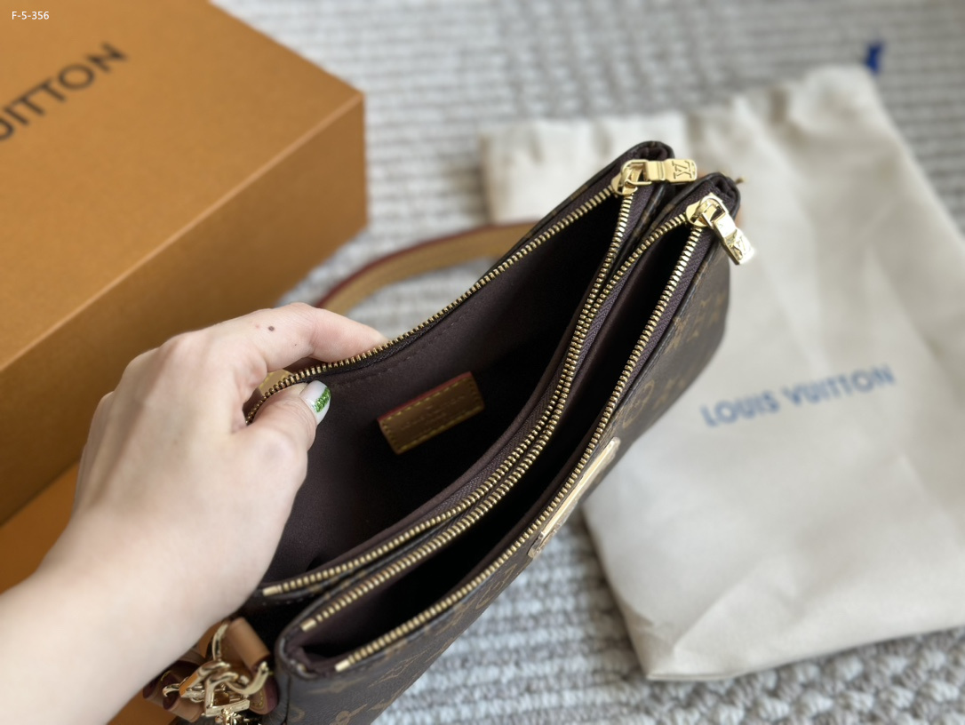 Louis Vuitton Liv Pochette Monogram Coated Canvas 20Cm M83008