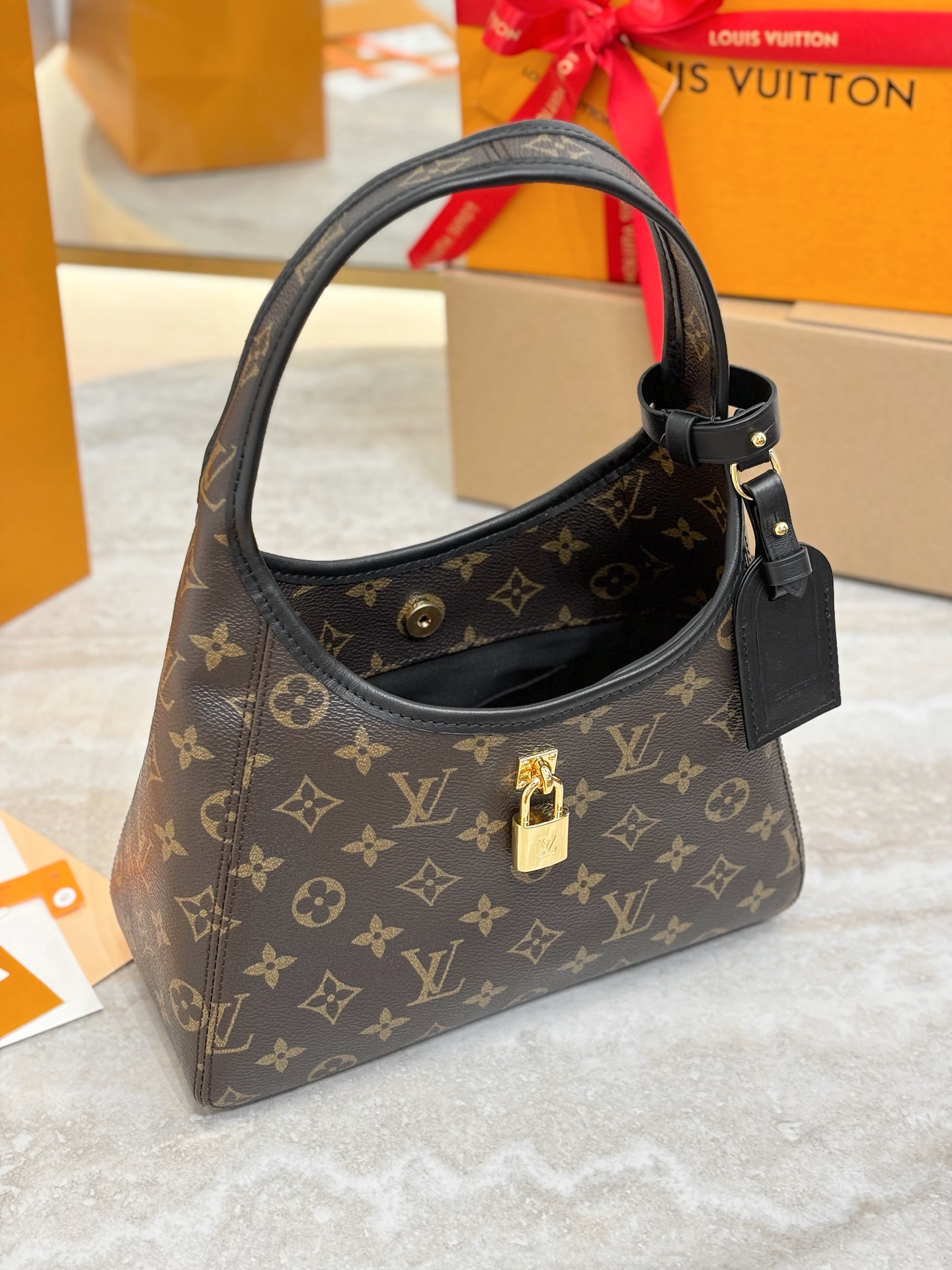 Louis Vuitton The Drop Pm Monogram Canvas M12940