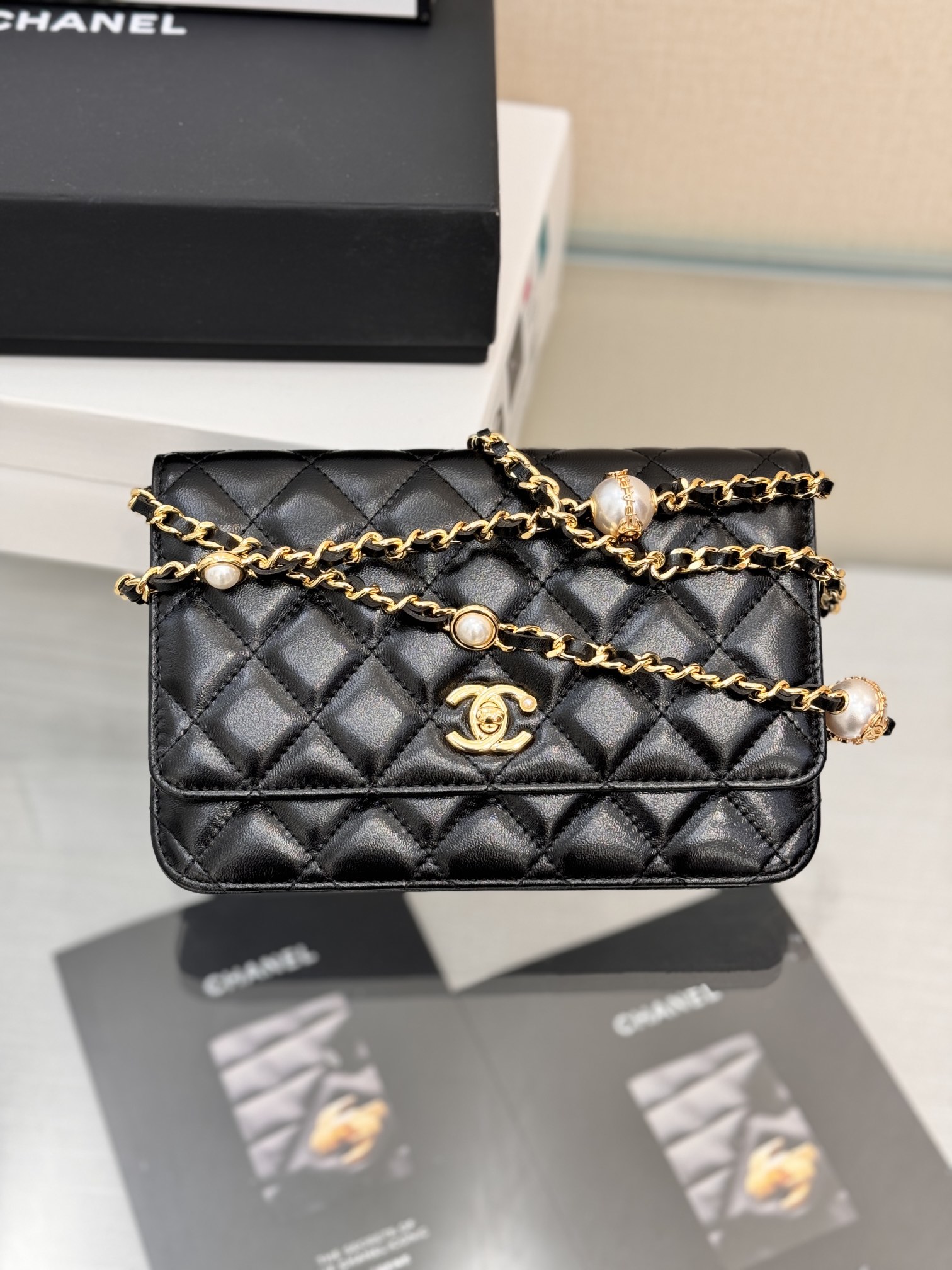 Classic Wallet On Chain (WOC) with Pearl Detail in Black Quilted Lambskin with Light Gold-Tone Hardware