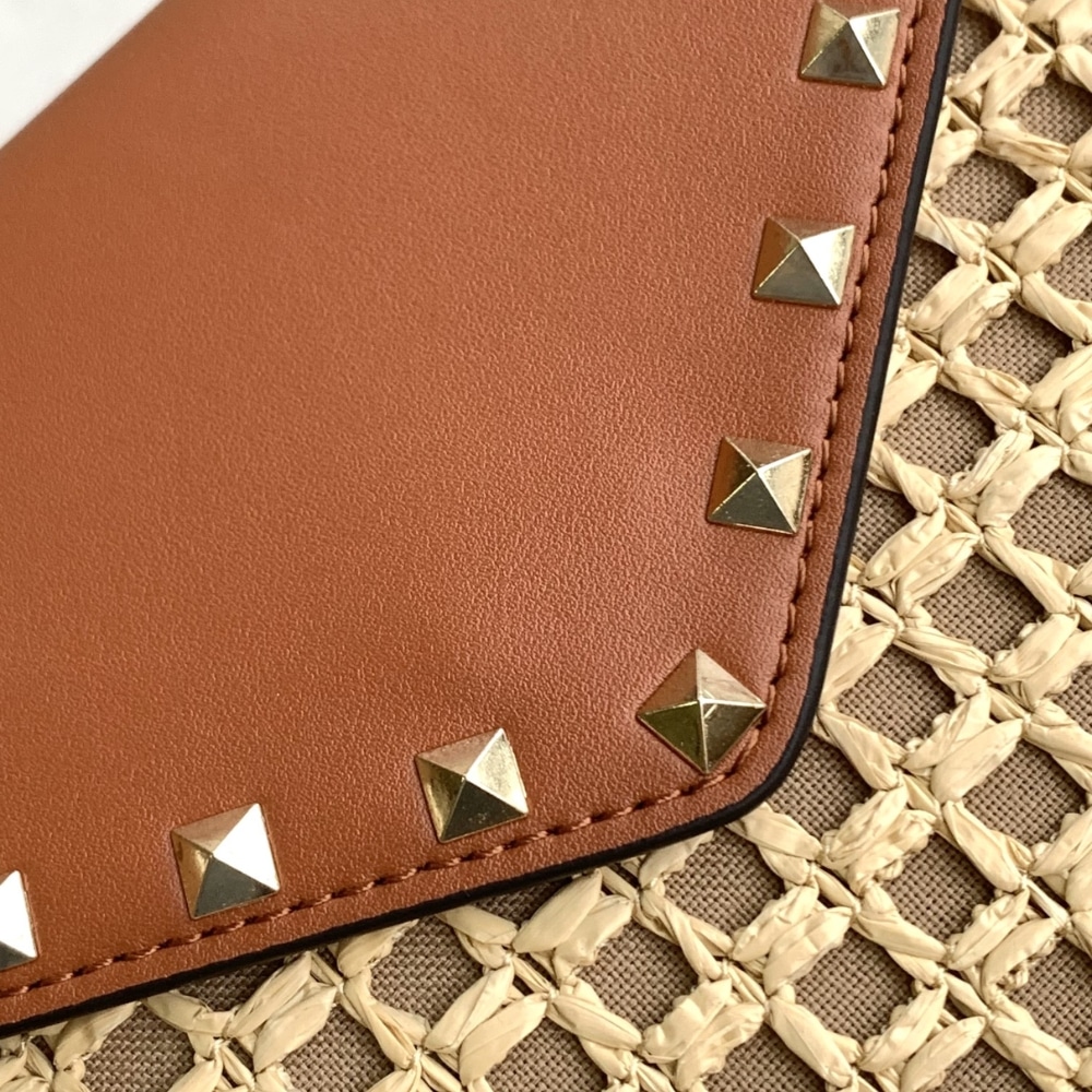 Valentino Garavani Rockstud Raffia Clutch Bag In Brown 28Cm