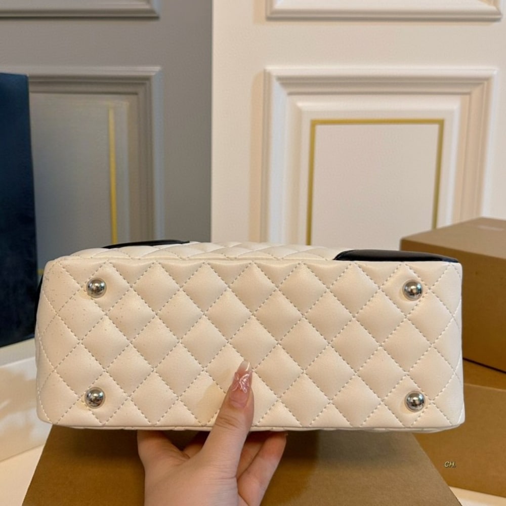 Chanel Cambon Bowler Bag Quilted Leather White And Black 26Cm