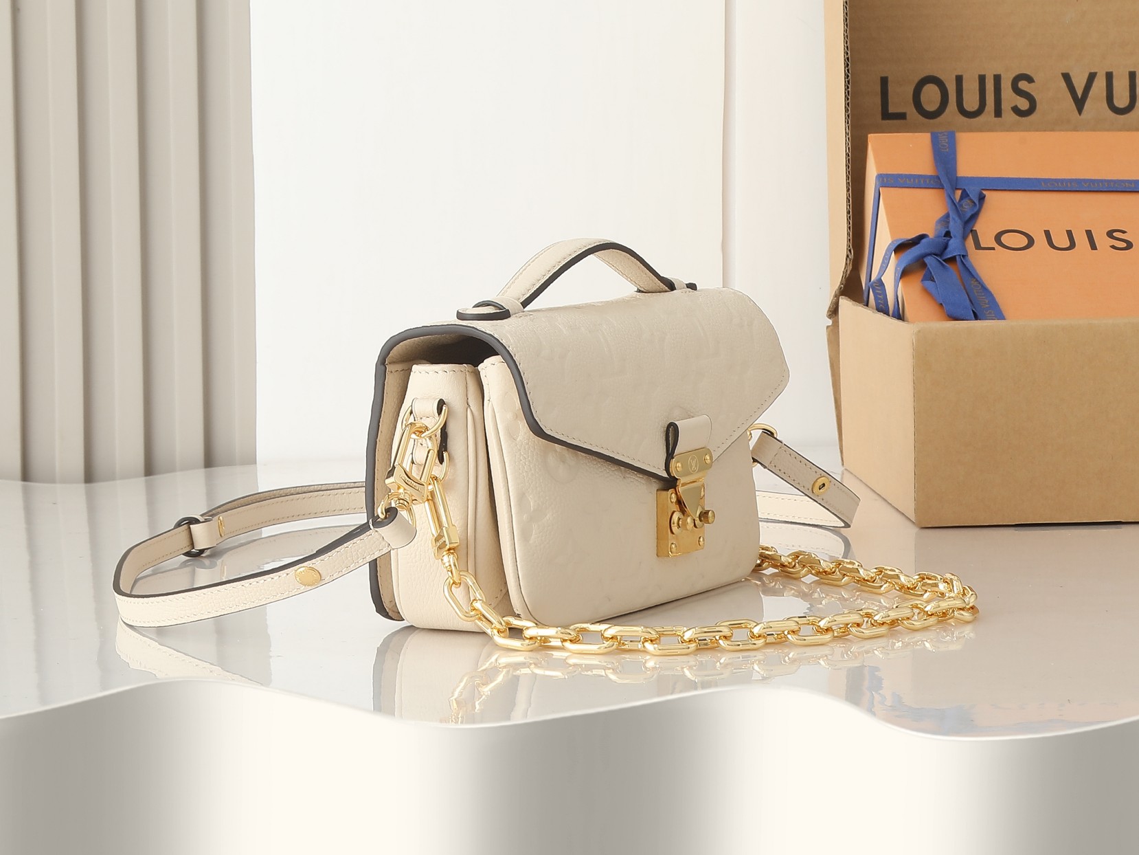 Louis Vuitton Pochette Métis East West Monogram Empreinte Leather – Women – Handbags Cream