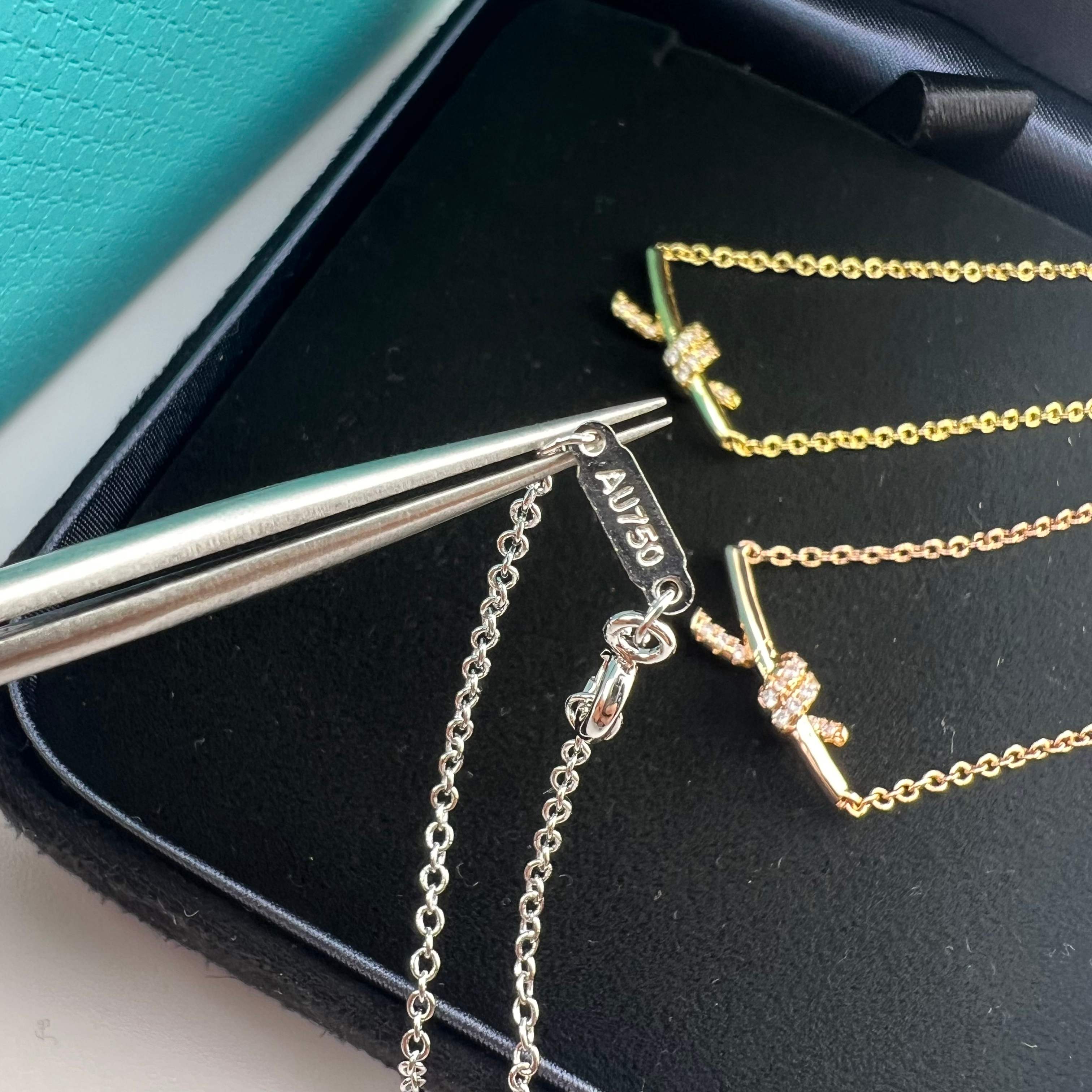 Small-sized diamond-encrusted twisted-knot collar necklace