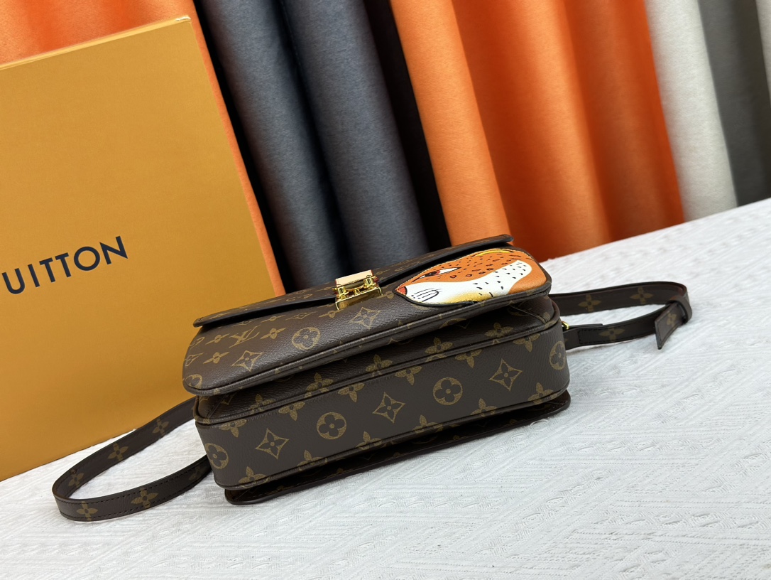 Louis Vuitton Pochette M Tis Monogram Coated Canvas 25Cm M47203