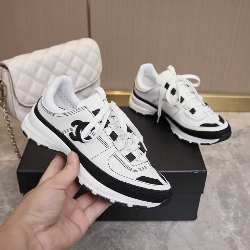 Chanel Lace Up Sneakers White Black