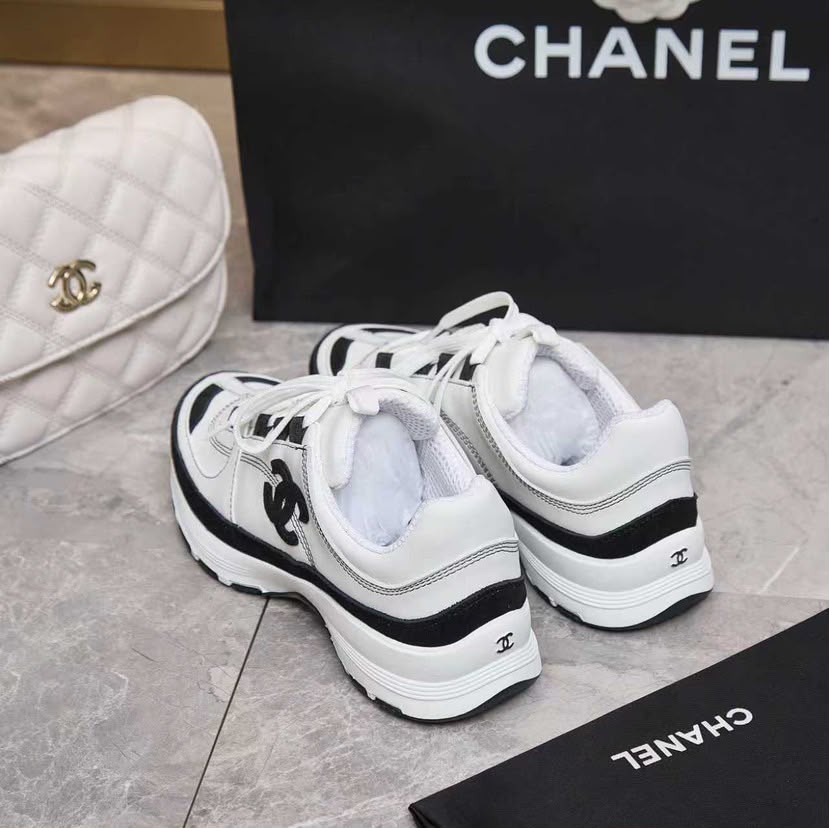 Chanel Lace Up Sneakers White Black
