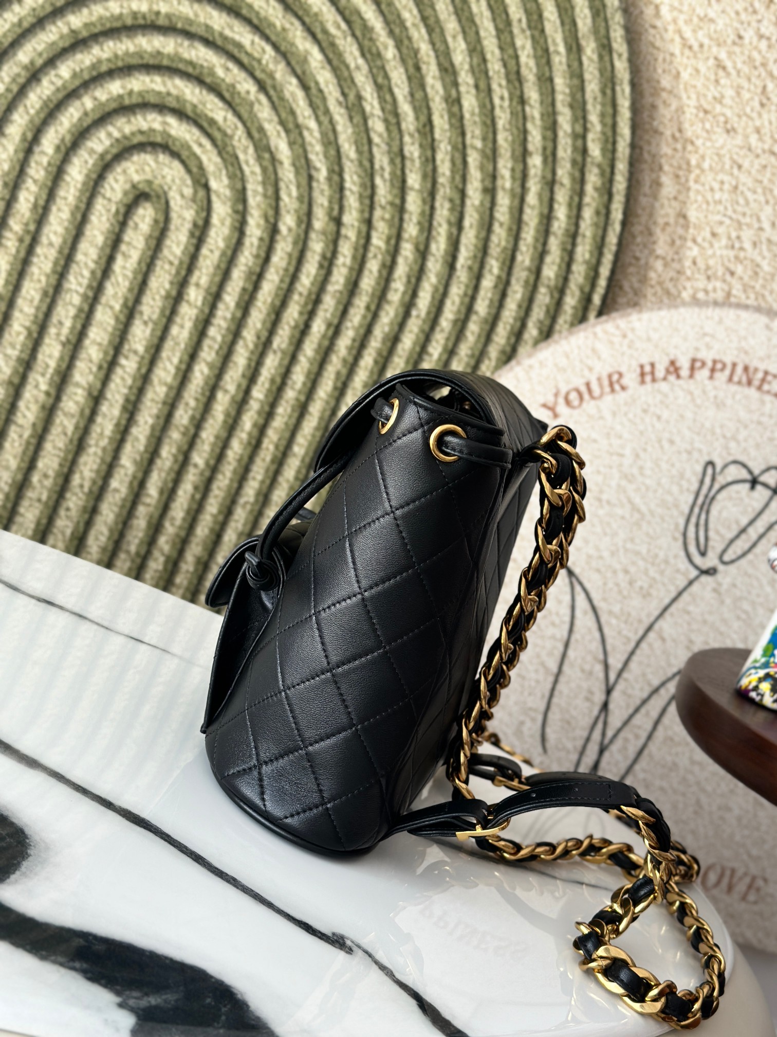Classic Quilted Lambskin Drawstring Backpack in Black (Gold Hardware)