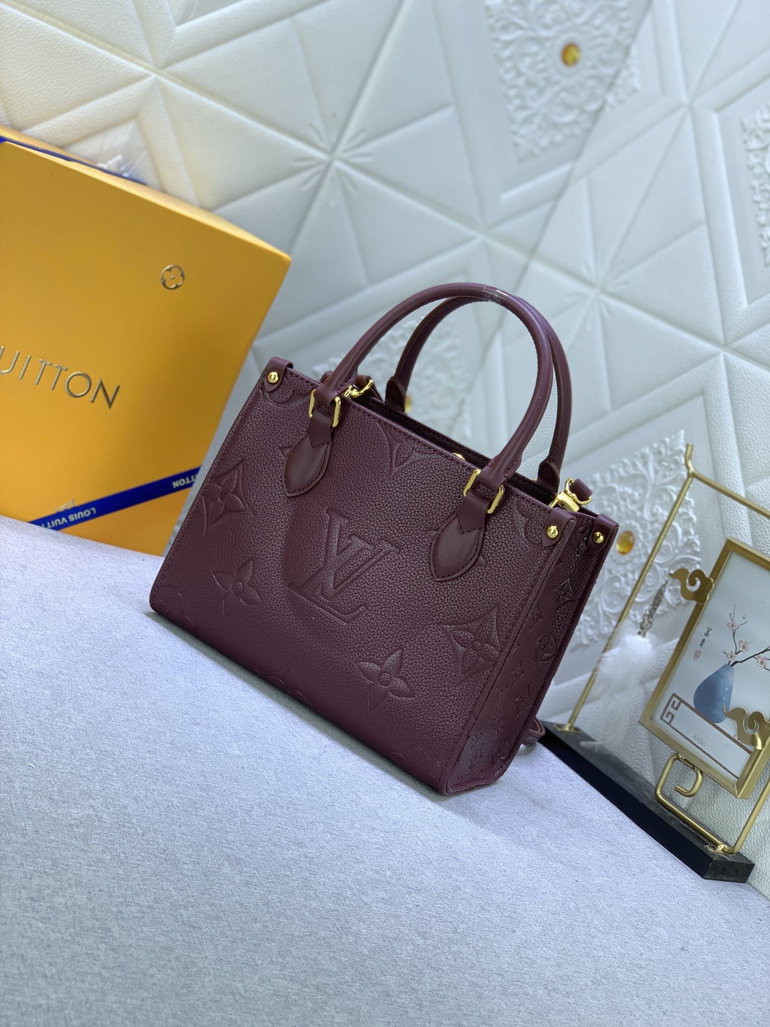 Louis Vuitton Onthego MM Monogram Empreinte Wine Red 25Cm M46601