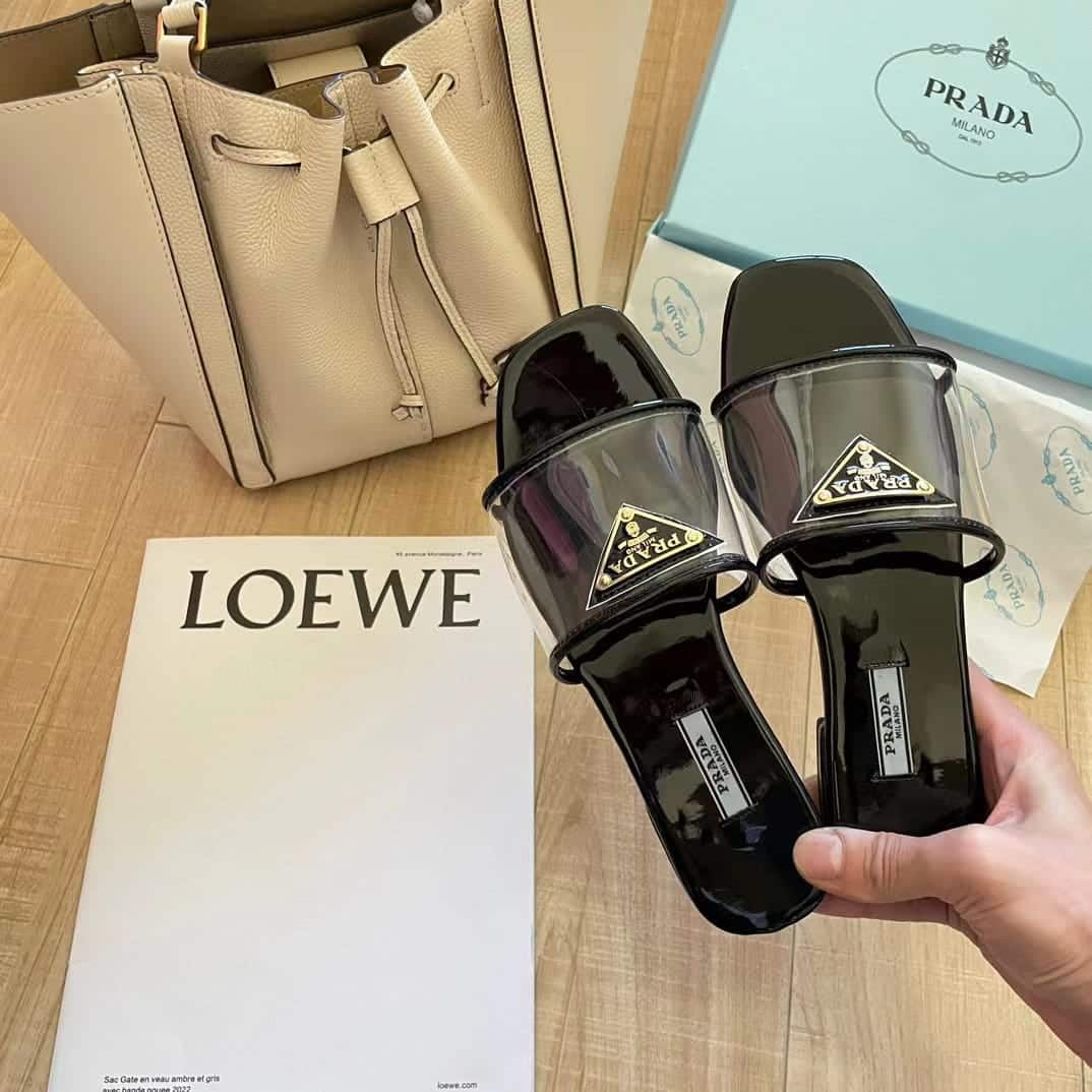 Prada Logo Plaque Slip On Black