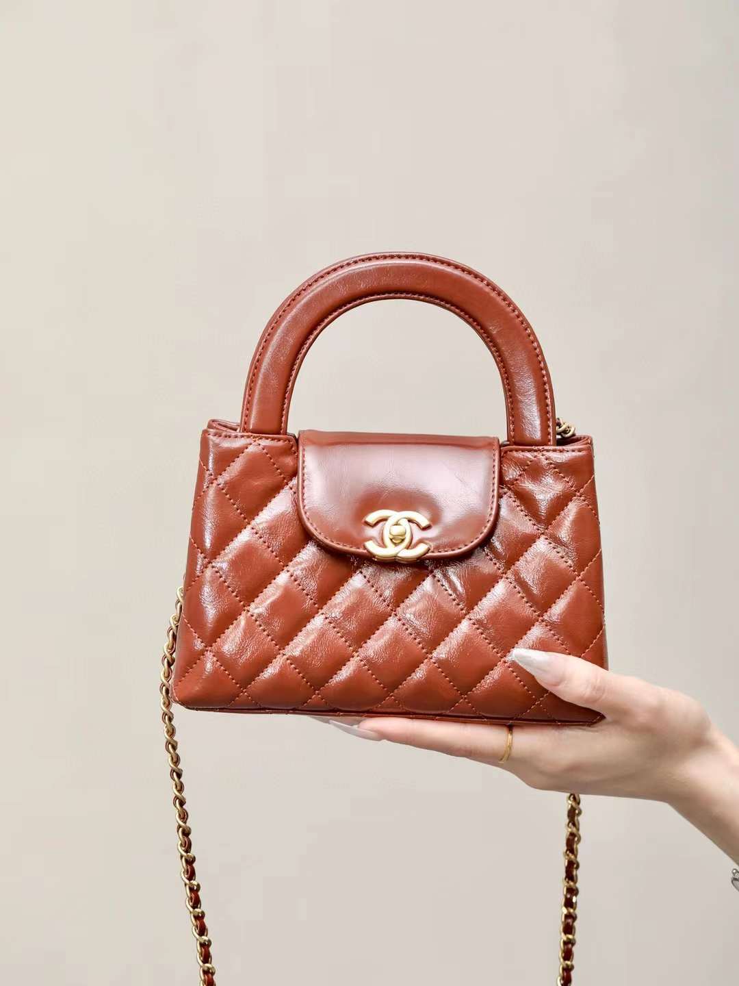 CHANEL 24S KELLY 鏈條手拿包 焦糖色