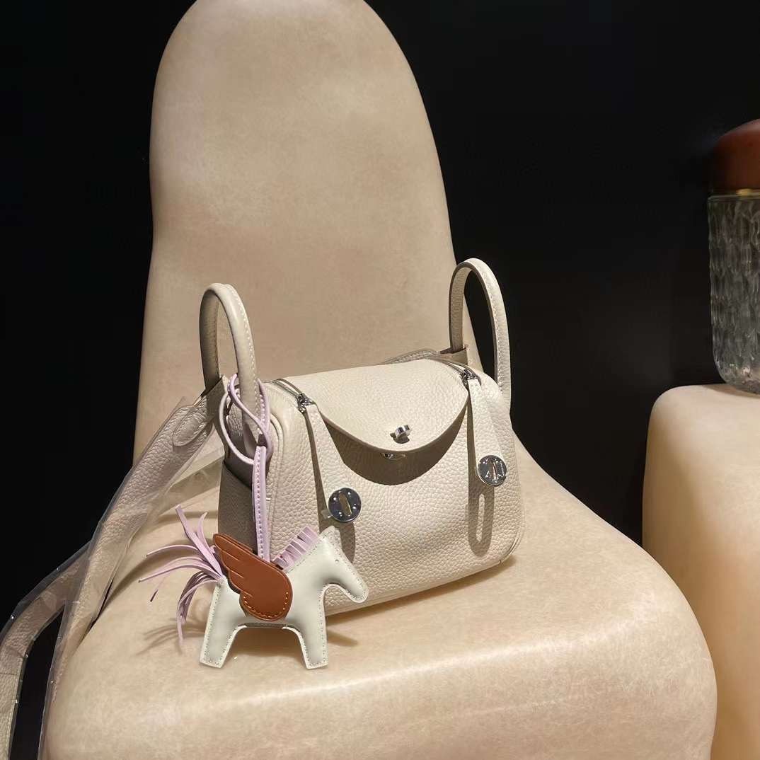 HERMES MINI LINDY CLEMENCE皮10奶昔白銀釦 轉釦手提/肩背兩用包