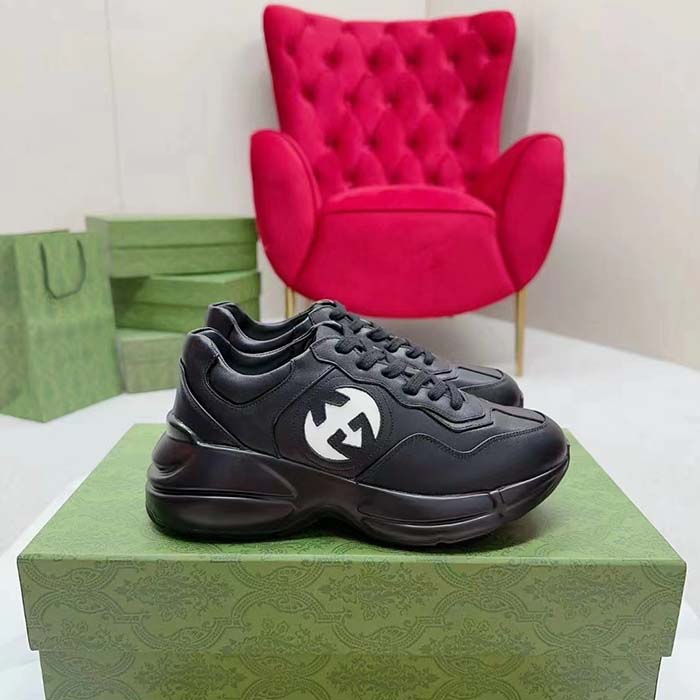 Gucci Unisex Interlocking G Rhyton Sneakers Black Leather White Cut-Out Rubber Sole