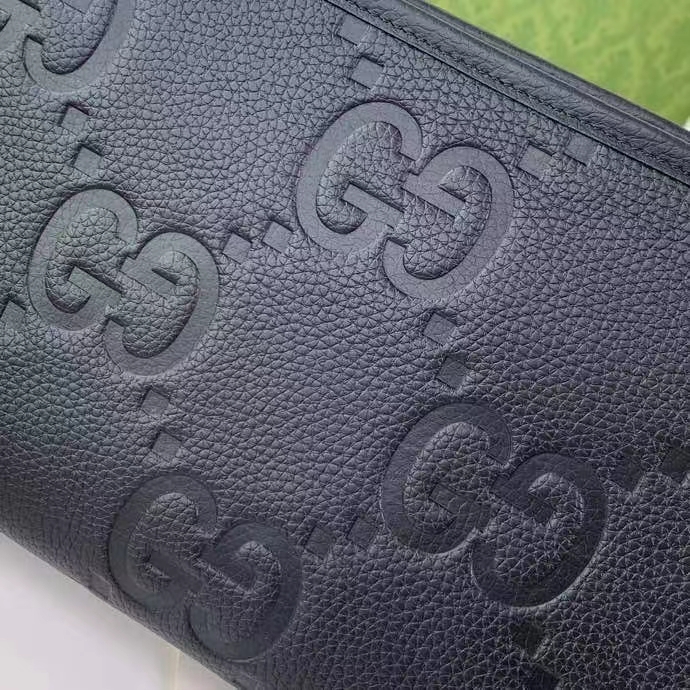 Gucci Unisex Jumbo GG Pouch Black Jumbo GG Leather Zip Closure