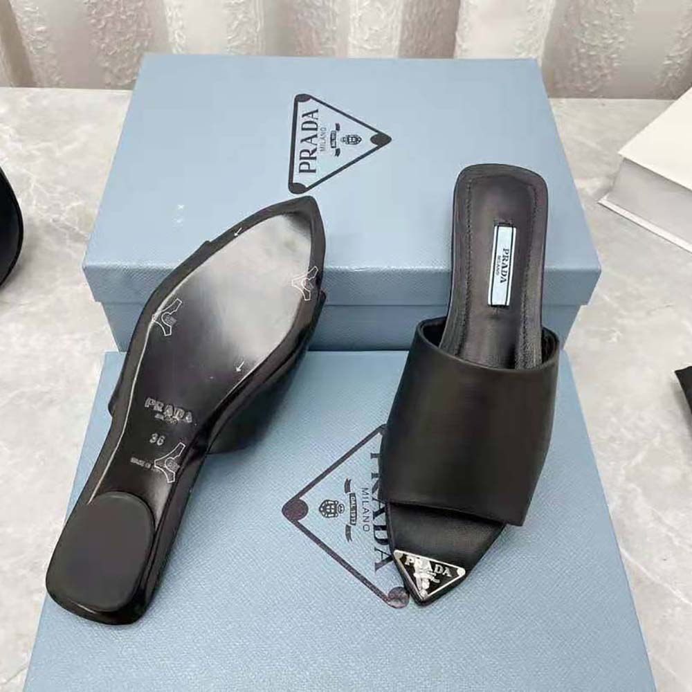 Prada Women Brushed Leather Slides with a Modernist Line Feature an Unexpected