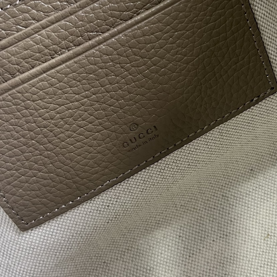 Gucci Unisex Jumbo GG Pouch Taupe Jumbo GG Leather Moiré Lining