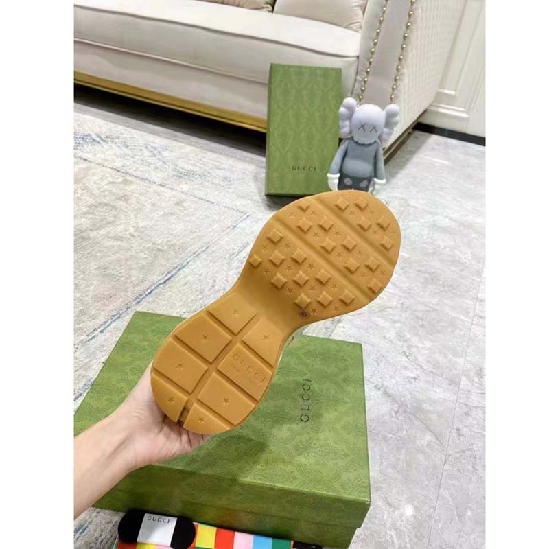 Gucci Unisex GG Rhyton Sneaker White Demetra Inlaid Interlocking G Stars Rubber Low Heel