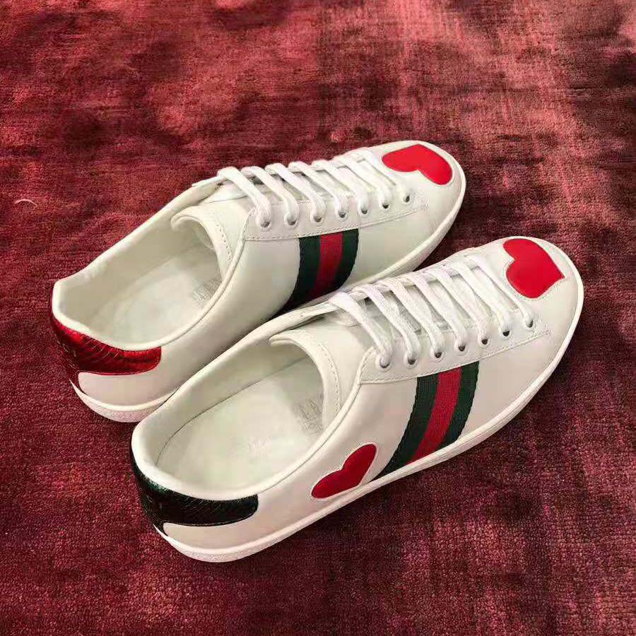 Gucci Women’s Ace Embroidered Sneaker with Two Leather Hearts in Rubber Sole-White