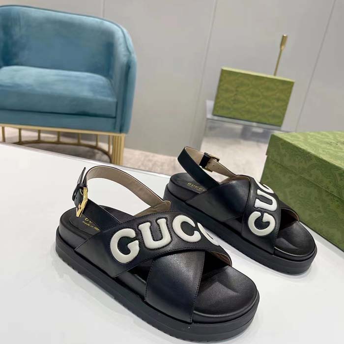 Gucci Unisex GG Sandal Black White Leather Script Rubber Buckle Flat