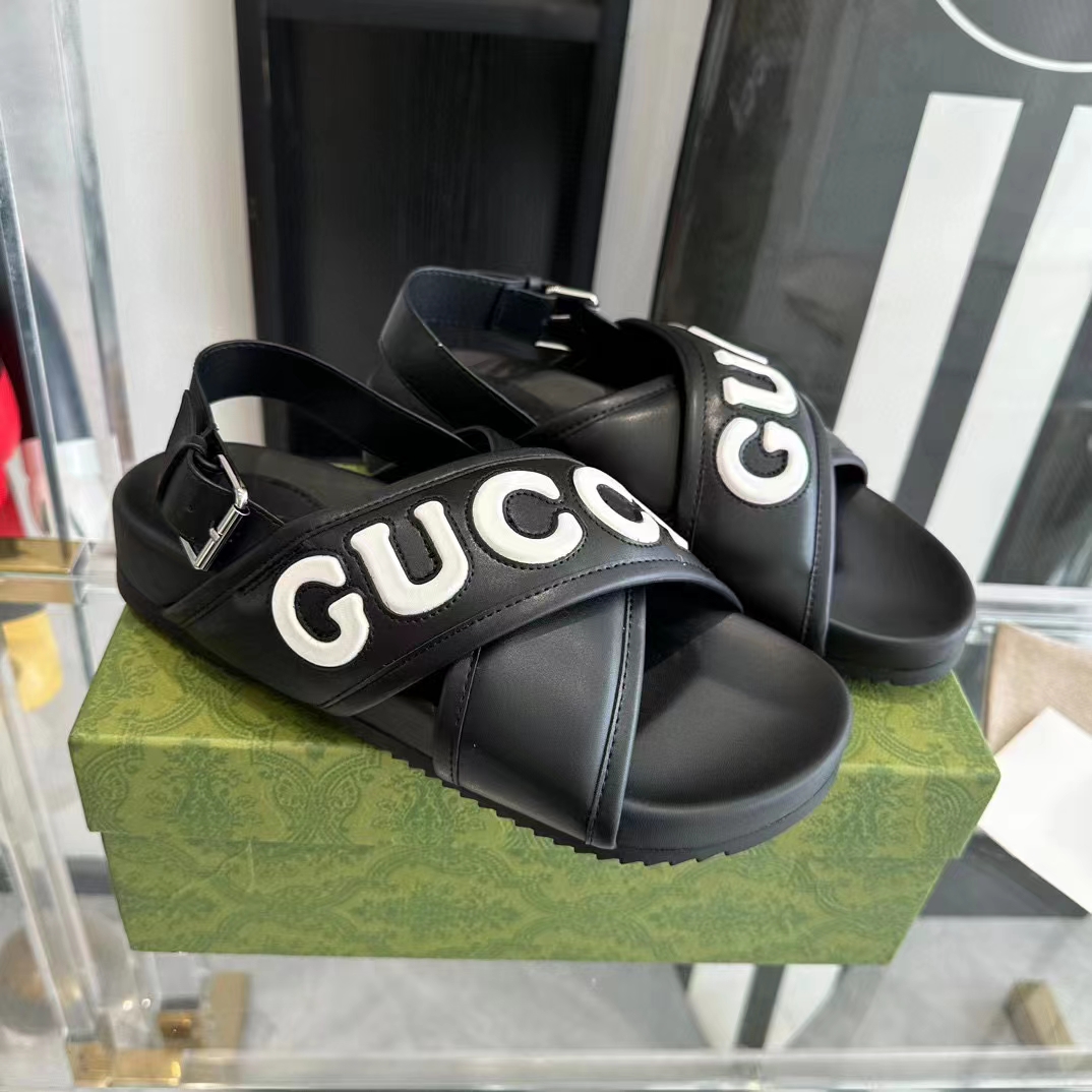 Gucci Unisex GG Gucci Sandal Smooth Black White Leather Script Rubber Buckle Flat