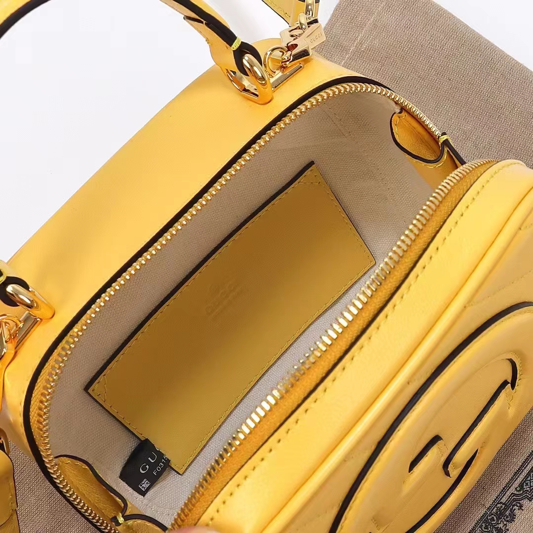 Gucci Women GG Blondie Top Handle Bag Yellow Leather Round Interlocking G