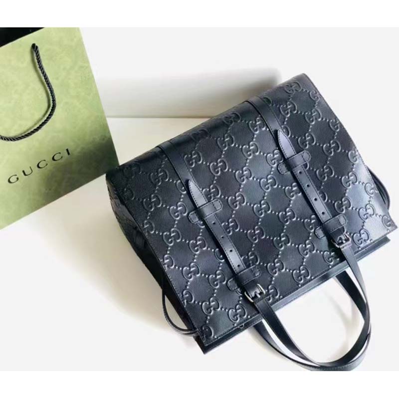 Gucci Unisex GG Embossed Tote Bag Black Leather Cotton Linen Lining