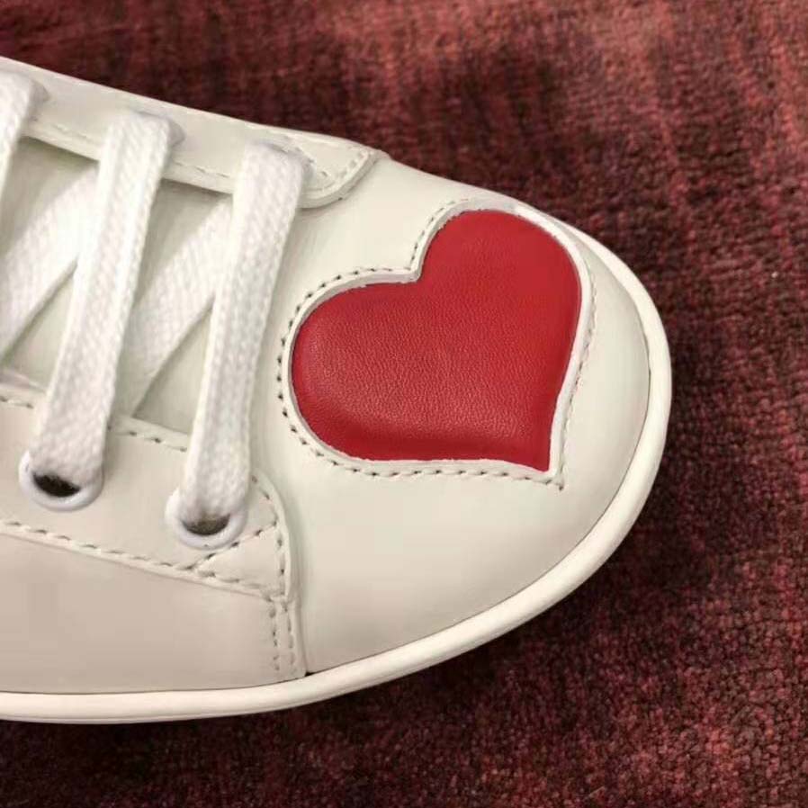 Gucci Women’s Ace Embroidered Sneaker with Two Leather Hearts in Rubber Sole-White