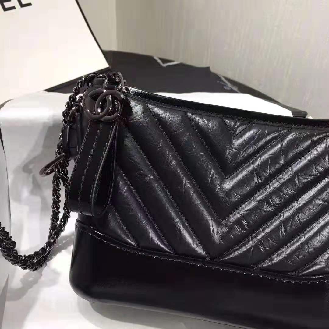Chanel Women Chanel’s Gabrielle Small Hobo Bag in Aged and Smooth Calfskin-Black