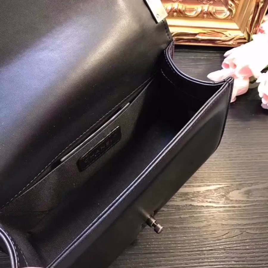 Chanel Boy Chanel Handbag in Chevron Quilted Calfskin Leather-Black