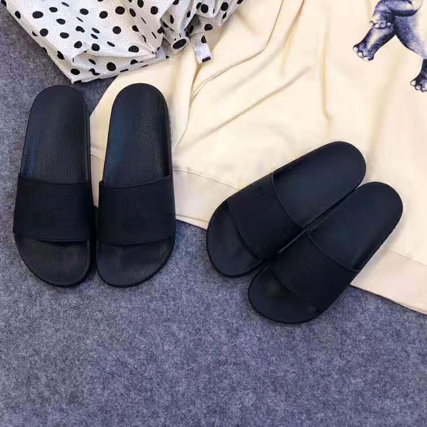 Gucci Unisex Gucci Logo Rubber Slide Sandal-Black