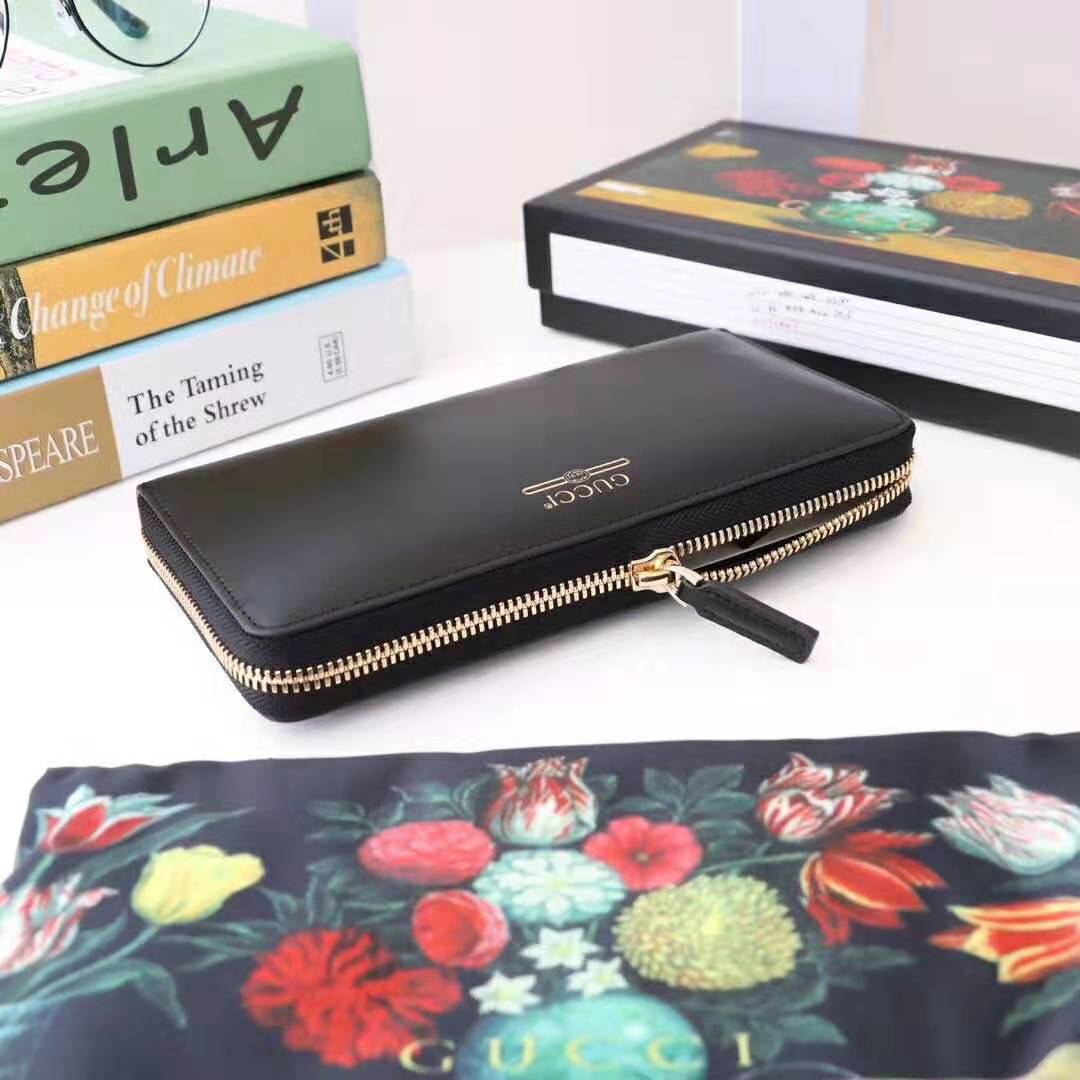 Gucci GG Unisex Leather Zip Around Wallet with Gucci Logo in Black Leather
