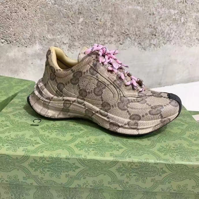 Gucci Unisex GG Run Sneaker Beige Ebony Leather GG Water Transfer Print