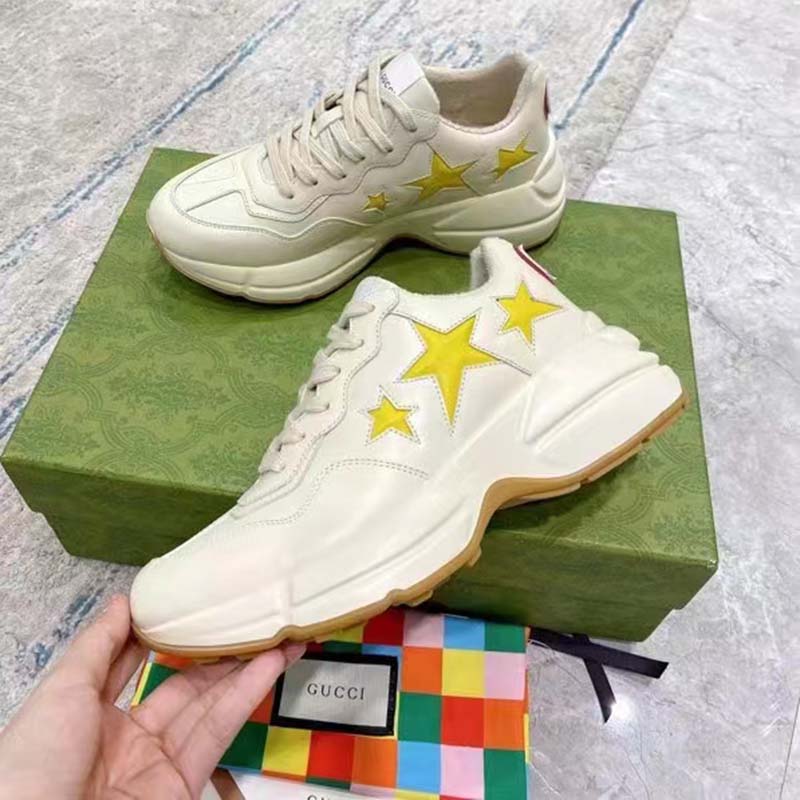 Gucci Unisex GG Rhyton Sneaker White Demetra Inlaid Interlocking G Stars Rubber Low Heel
