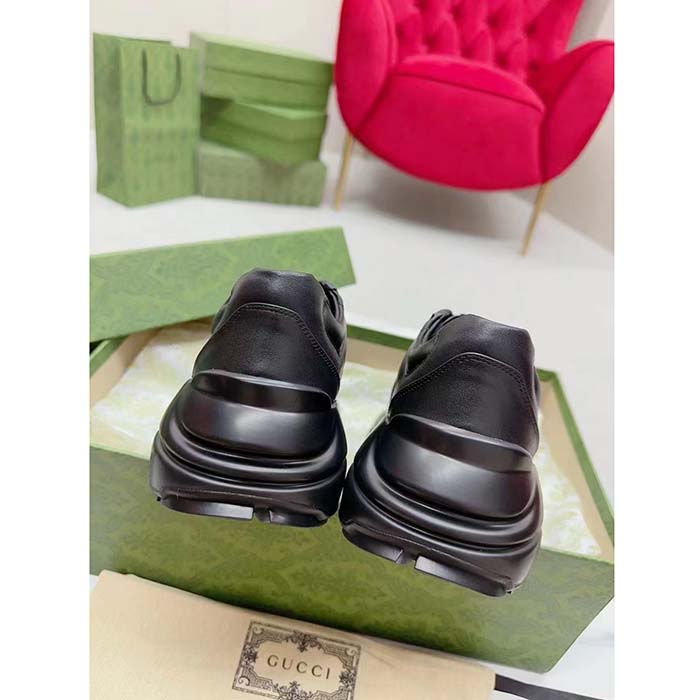 Gucci Unisex Interlocking G Rhyton Sneakers Black Leather White Cut-Out Rubber Sole