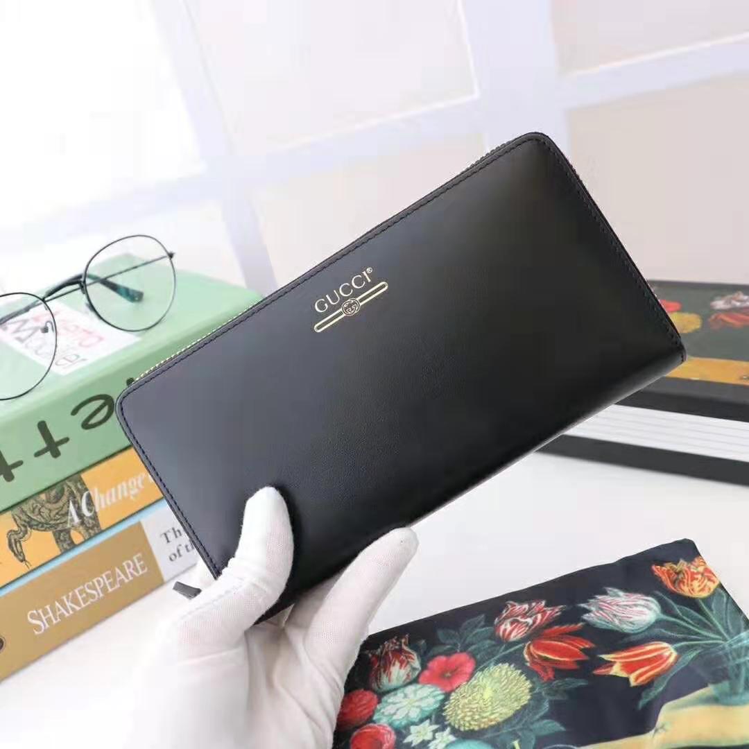 Gucci GG Unisex Leather Zip Around Wallet with Gucci Logo in Black Leather