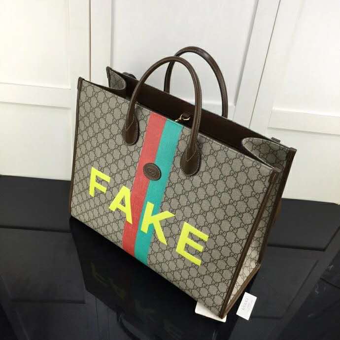 Gucci Unisex ‘Fake/Not’ Print Large Tote Bag GG Supreme Canvas