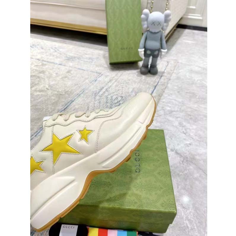 Gucci Unisex GG Rhyton Sneaker White Demetra Inlaid Interlocking G Stars Rubber Low Heel