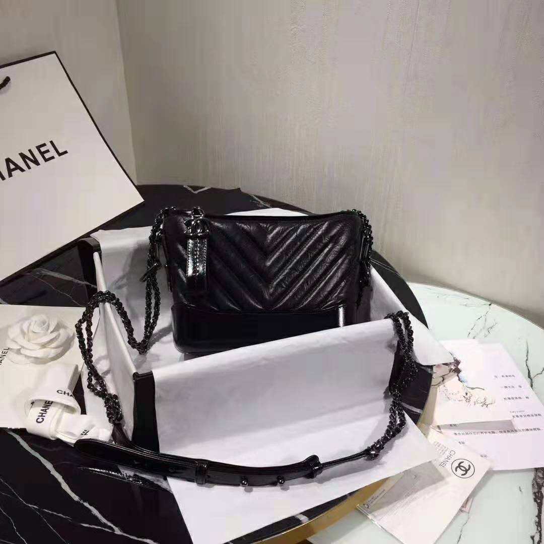 Chanel Women Chanel’s Gabrielle Small Hobo Bag in Aged and Smooth Calfskin-Black