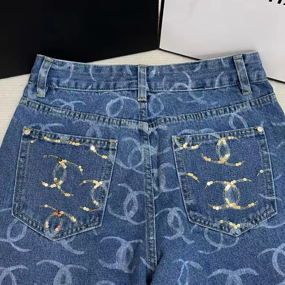 Chanel Women CC Jeans Flared Jeans in Washed Denim