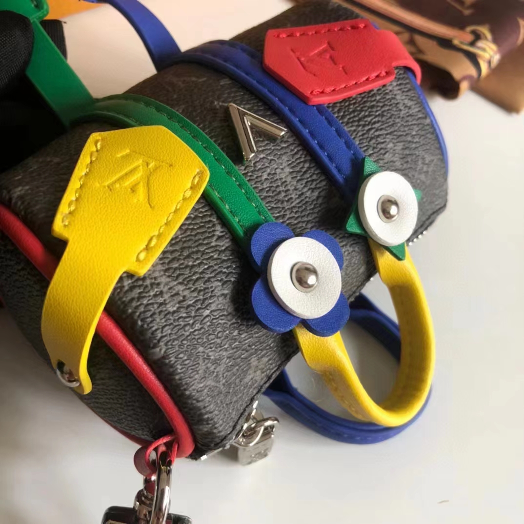 Louis Vuitton Unisex LV Mister Keepall Key Holder Bag Charm Monogram Eclipse Coated Canvas Leather