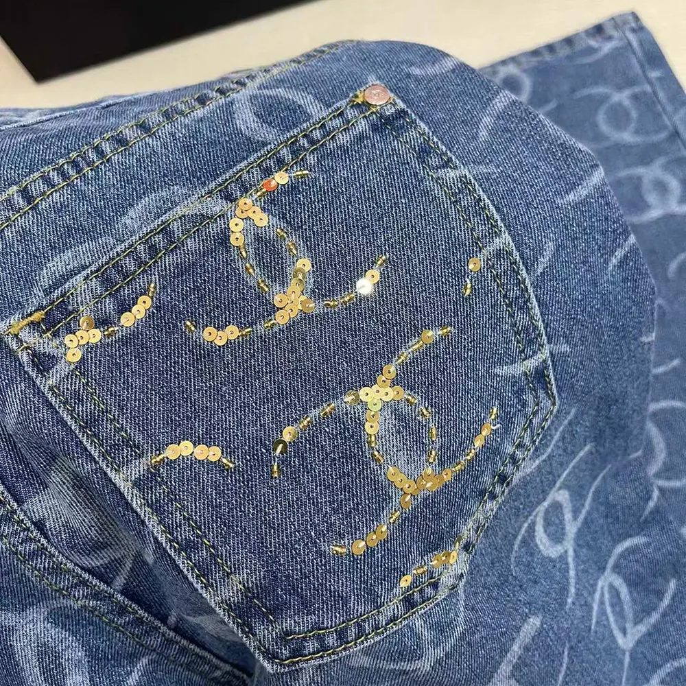 Chanel Women CC Jeans Flared Jeans in Washed Denim