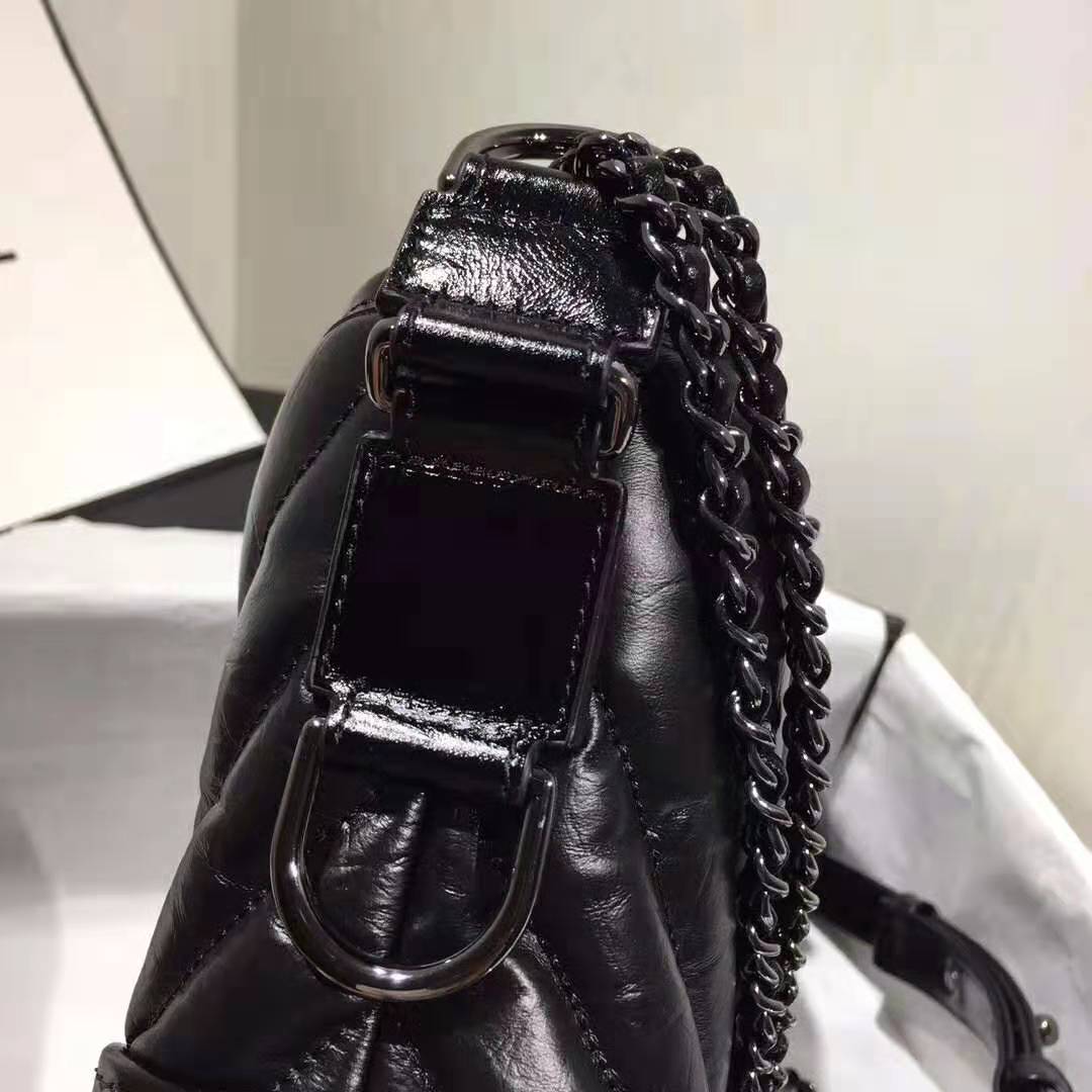 Chanel Women Chanel’s Gabrielle Small Hobo Bag in Aged and Smooth Calfskin-Black