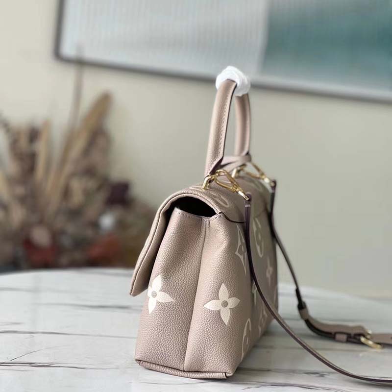 Louis Vuitton LV Women Madeleine MM Handbag Embossed Monogram Empreinte Cowhide