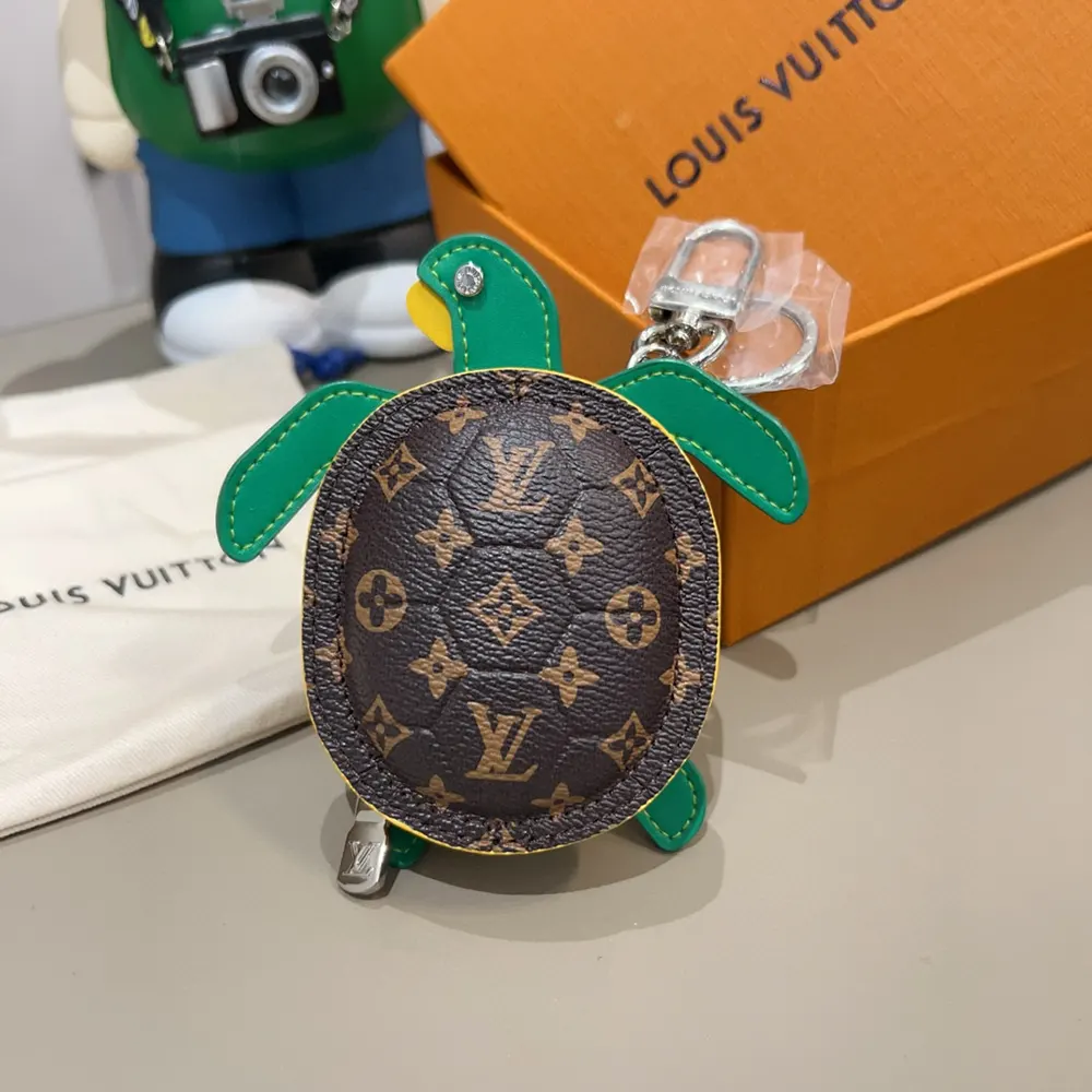 Louis Vuitton LV Women LV Turtle Pouch Bag Charm-Brown M01471