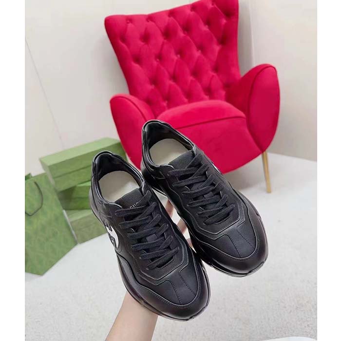 Gucci Unisex Interlocking G Rhyton Sneakers Black Leather White Cut-Out Rubber Sole