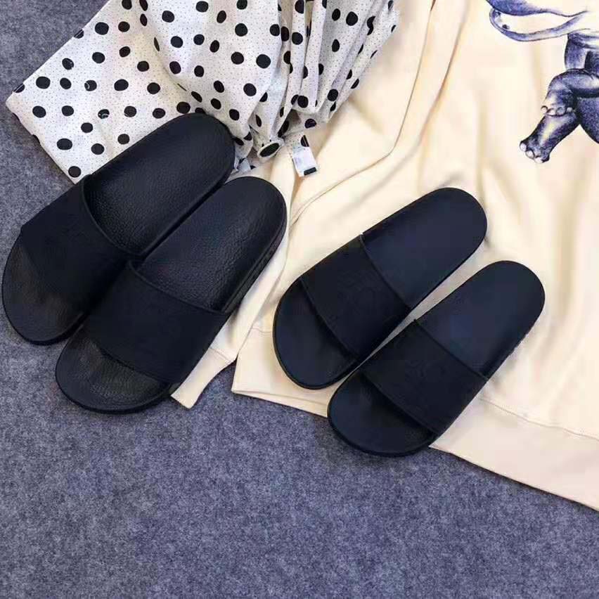 Gucci Unisex Gucci Logo Rubber Slide Sandal-Black