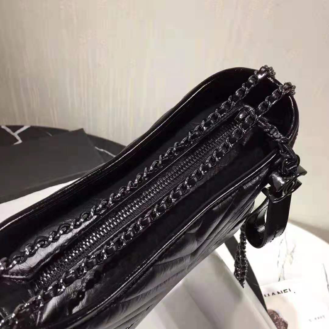 Chanel Women Chanel’s Gabrielle Small Hobo Bag in Aged and Smooth Calfskin-Black